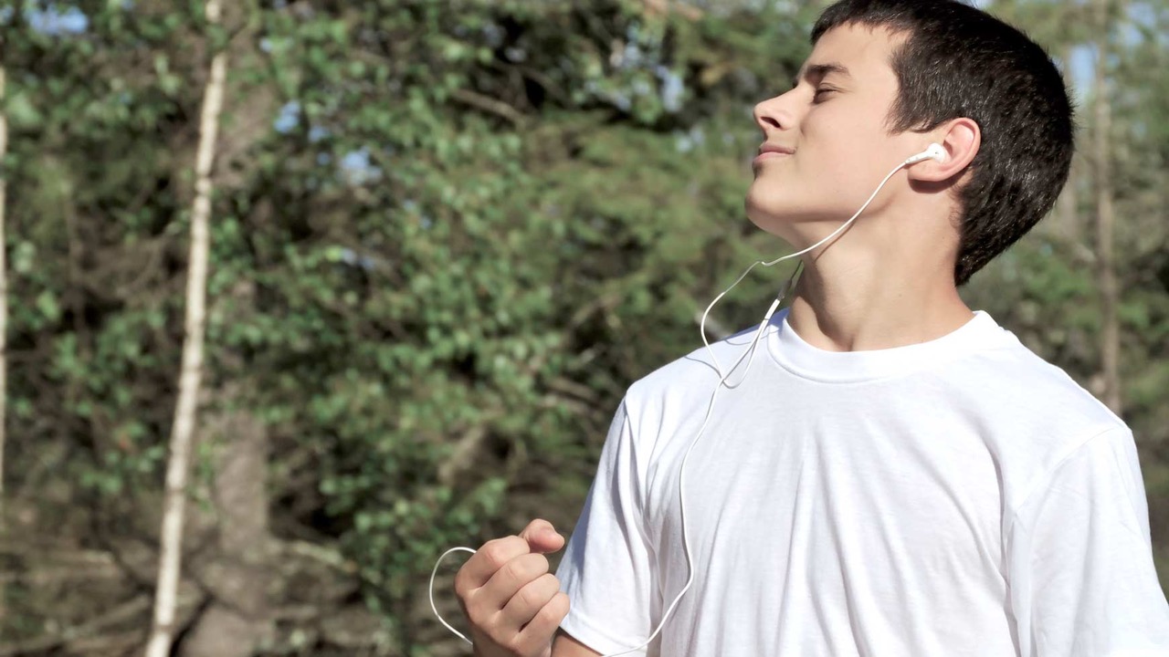 guy listening to music outdoors